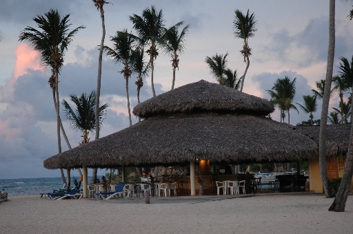 Beach restaurant at sunset 